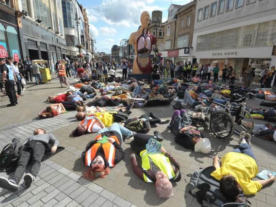 The Extinction Rebellion protesters held a 'die-in' in the centre of Leeds. Picture: Tony Johnson