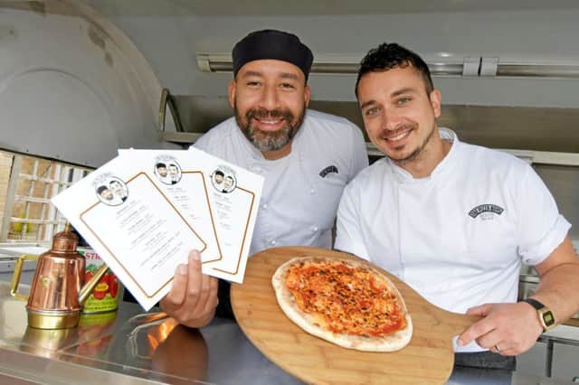 The Pizza Boys are using pizza scented menus.