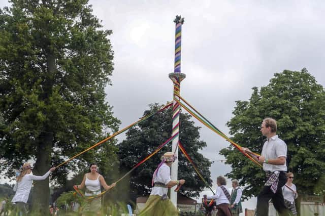 May Pole dancers at BBC Countryfile Live at Blenheim Palace in Woodstock, Oxfordshire. Picture by Steve Parsons/PA Wire.