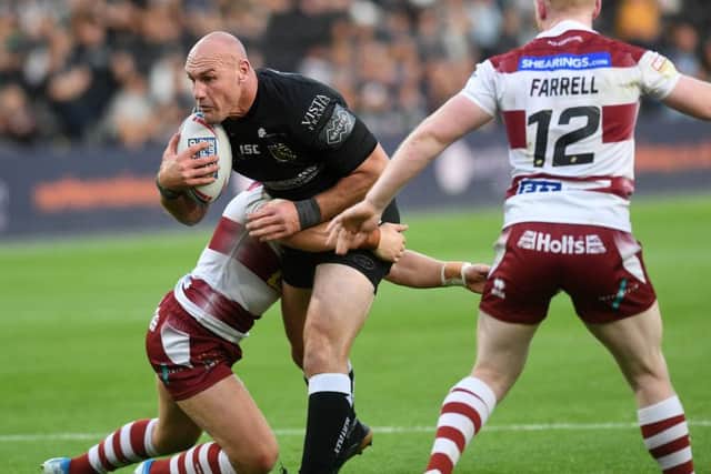 Hull's Gareth Ellis drives for the Wigan line on Thursday night.
 (Picture: Jonathan Gawthorpe)