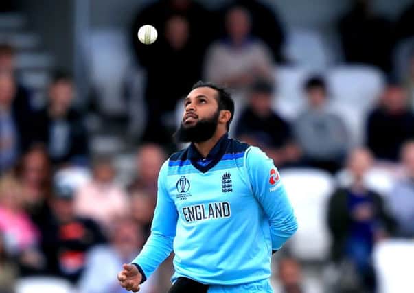 England's Adil Rashid celebrates catching Sri Lanka's Jeevan Mendis out off his own bowling during the World Cup at Headingley. Picture: Simon Cooper/PA
