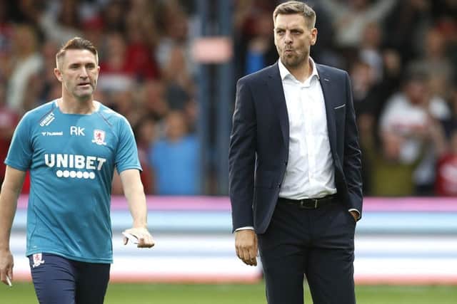 Middlesbrough manager Jonathan Woodgate (right) and coach Robbie Keane got their season underway at Kenilworth Road last night. Picture: Darren Staples/PA