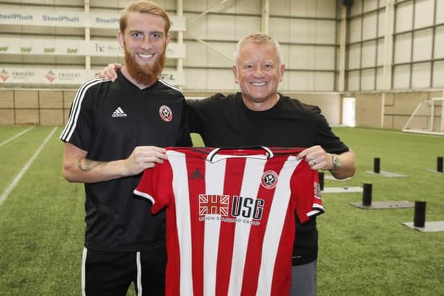 Oliver McBurnie welcomed by manager Chris Wilder at the Shirecliffe Training Comple. Picture: Simon Bellis/Sportimage