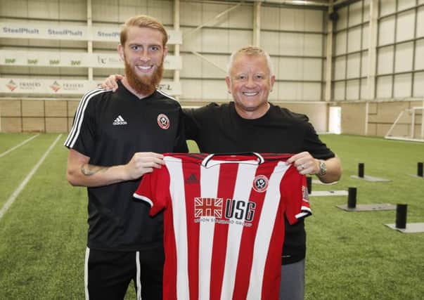 Oliver McBurnie welcomed by manager Chris Wilder at the Shirecliffe Training Complex. Picture: Simon Bellis/Sportimage