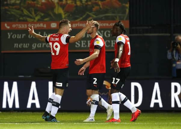 Luton Town's James Collins (left) celebrates scoring his side's equaliser against Middlesbrough. Picture: Darren Staples/PA