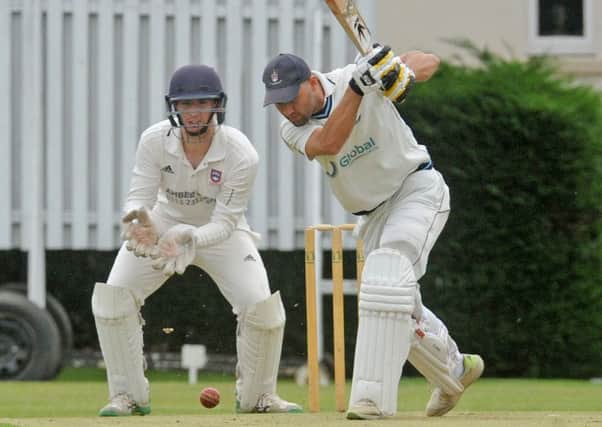 Driving force:  Pakistani overseas batsman 
Sami Ullah Alfridi on his way an unbeaten 67 as Batley defeated Pudsey Congs to stay clear at the top of the Bradford League  Championship. Picture: Steve Riding