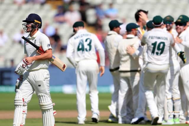 Gone: Rory Burns walks off after losing his wicket.