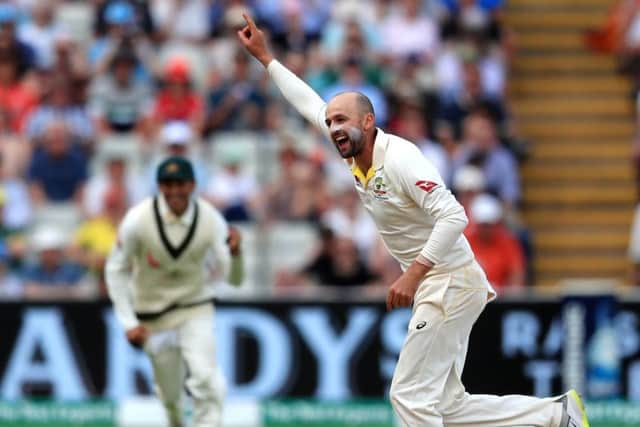 Australia's Nathan Lyon celebrates taking the wicket of England's Moeen Ali (Picture: PA)