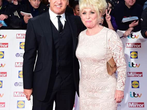 Dame Barbara Windsor and her husband Scott Mitchell, who have called on Prime Minister Boris Johnson to solve the dementia care crisis as they were named ambassadors of charity Alzheimer's Society. Picture: Ian West/PA Wire
