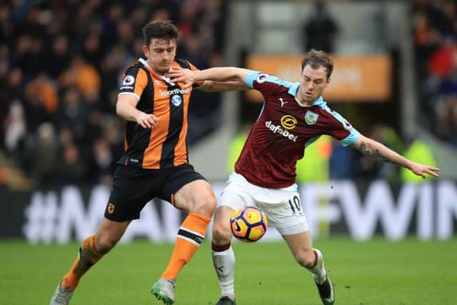 WINDFALL: Harry Maguire, in action for Hull against Burnley. Picture: Mike Egerton/PA
