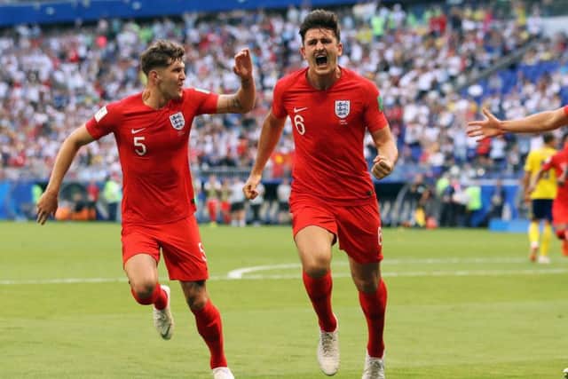 England's Harry Maguire (centre) celebrates scoring against Sweden in last year's World Cup quarter-final in Russia. Picture: Owen Humphreys/PA