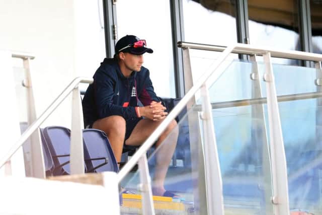 PLENTY TO PONDER: England captain Joe Root sits on the balcony during day five at Edgbaston: Mike Egerton/PA