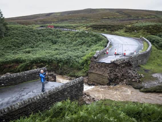 The collapsed bridge near Grinton, North Yorkshire. A temporary bridge will replace the bridge allowing the prestigious UCI Road World Championship bike race to stay on its intended route. Picture: PA
