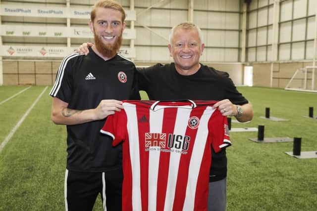 Oliver McBurnie welcomed by manager Chris Wilder. Picture: Simon Bellis/Sportimage