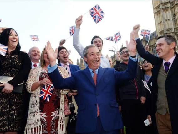 Nigel Farage and his supporters celebrate in London in June 2016 the night after Britain's vote to leave the European Union. Picture: Anthony Devlin/PA Wire