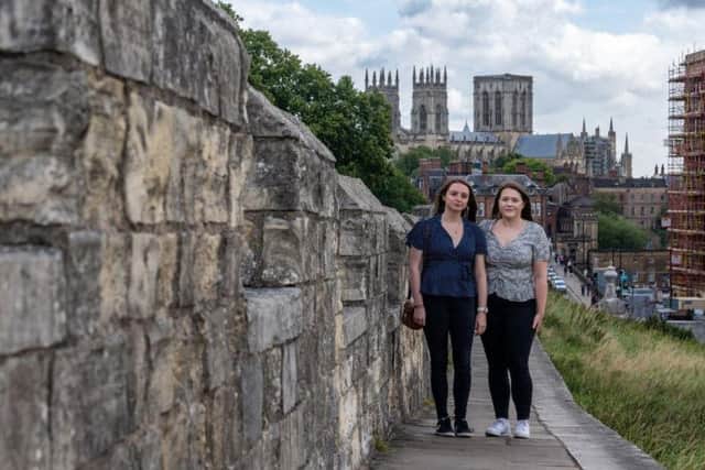 The York Walls festival will be held this weekend in York. Pictured: Rebecca Spencer, and Holly Graham, York Walls Assistance, for the event. Pic: James Hardisty