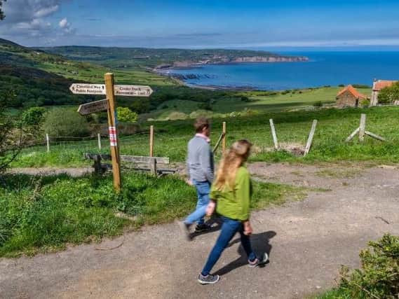 A couple out walking in Ravenscar, near between Whitby and Scarborough. Picture: James Hardisty.