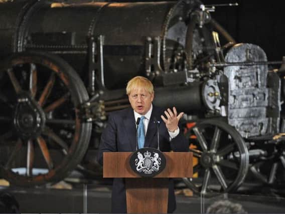 Prime Minister Boris Johnson gave a speech on domestic priorities at the Science and Industry Museum in Manchester in front of Stephenson's Rocket. Photo: Rui Vieira/PA Wire