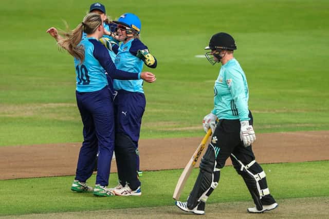 Yorkshire's Helen Fenby, left, celebrates with Alyssa Healy after taking the wicket of Surrey's Lizelle Lee. Picture: Alex Whitehead/SWpix.com