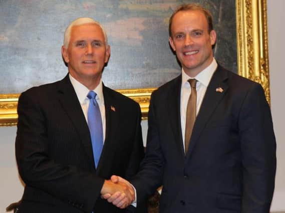 Foreign Secretary Dominic Raab with US Vice President Mike Pence.