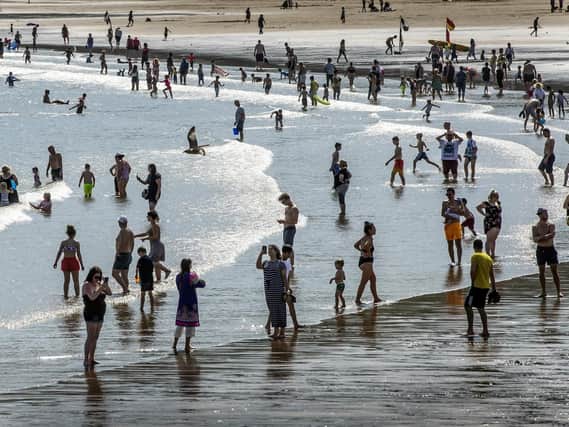 The hot weather in July did not provide a boost for retailers Picture: PA