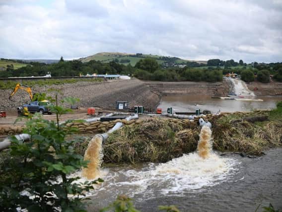The dam at Toddbrook Reservoir near the village of Whaley Bridge was damaged in heavy rainfall. Photo: Joe Giddens/PA Wire