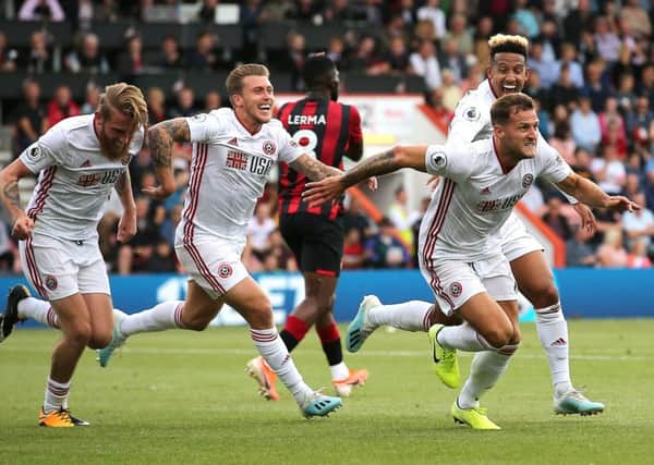 Sheffield United's Billy Sharp (right) celebrates scoring his side's equaliser at Bournemouth (Picture: Mark Kerton/PA)
