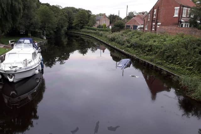 A passing driver spotted the sunken canal boat. Photo provided by Ben Cairns, of North Yorkshire Fire & Rescue Service.