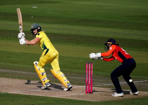 Heading for the games: Women's T20 action as Australia's Ellyse Perry hits out against England at Hove.