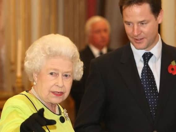 The Queen, pictured with former Deputy Prime Minister Nick Clegg, has reportedly expressed her disappointment with current politicians. Picture: PA