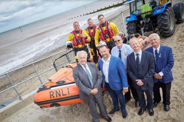 Pictured, back, from left, Helmsmen Darren Hickey, Steve Roebuck and Matthew Woodhouse; and front, from left, John and Richard Beal and Martin Woodhouse, Adrian Carey and Malcolm Watkinson of the RNLI