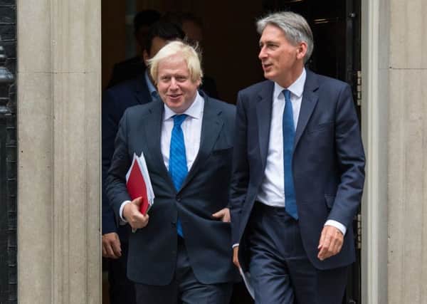 Boris Johnson and Philip Hammond remain at loggerheads over Brexit.