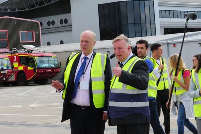 Chris Grayling, the former Transport Secretary, during a visit to Leeds Bradford Airport.