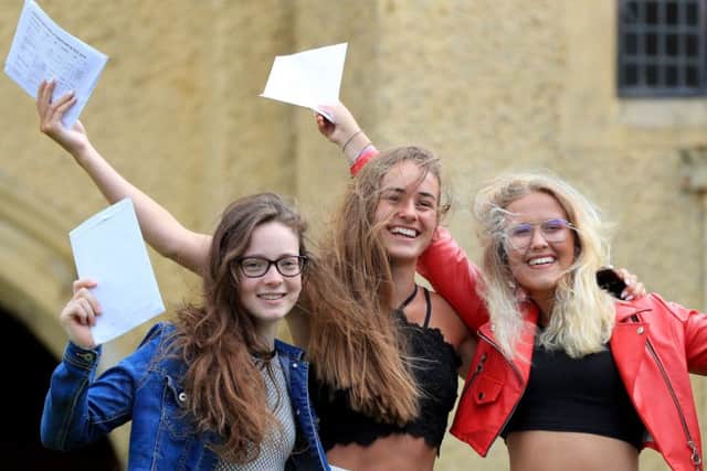 Joyous students celebrate their A-Level results.