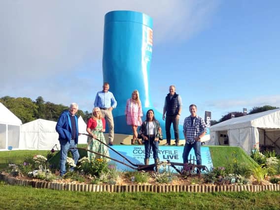 Countryfile presenters John Craven, Charlotte Smith, Tom Heap, Ellie Harrison, Anita Rani, Adam Henson and Matt Baker open the four-day Countryfile Live event at Castle Howard. Picture by Tony Johnson.