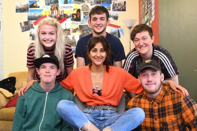 Taj Atwal (centre), with young people currently being supported by SASH