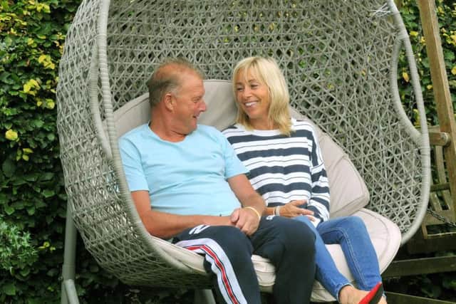 Dave and Sally Young, pictured at their home in Beeford near Driffield. After his heart attack at the age of 28, Mr Young battled with depression. With Sally's backing, and after seeking support and speaking out over his challenges with ill mental health, Mr Young is in a better place.