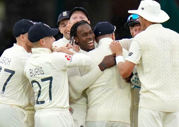 England's Jofra Archer (centre) celebrates taking the wicket of Australia's Cameron Bancroft  with team mates during day three of the Ashes Test match at Lord's, London. (Picture: John Walton/PA Wire)