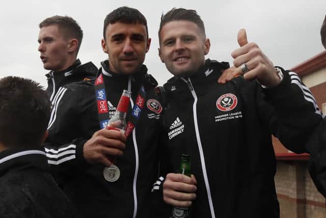 Oliver Norwood enjoying a beer while on the Blades open-top bus parade to celebrate their promotion in May.