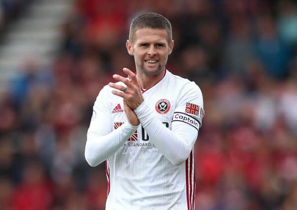 Honoured: Oliver Norwood wore the captains armband for Sheffield United at Bournemouth (Pictures: sportimage)