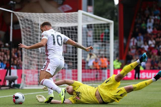Billy Sharp of Sheffield United takes the ball around Aaron Ramsdale of Bournemouth. (Picture: James Wilson/Sportimage)