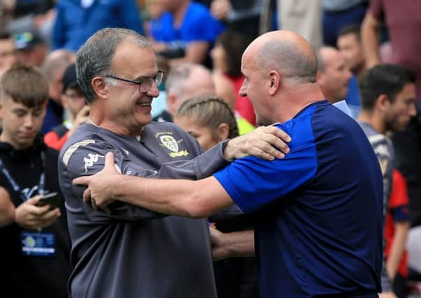 All the best: Wigan Athletic manager Paul Cook and Leeds United head coach Marcelo Bielsa.