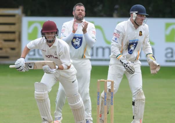 Heading to the title: Brad Schmulian, of leaders Woodlands, top-scored with 54 as they defeated Pudsey St Lawrence. Picture: Steve Riding