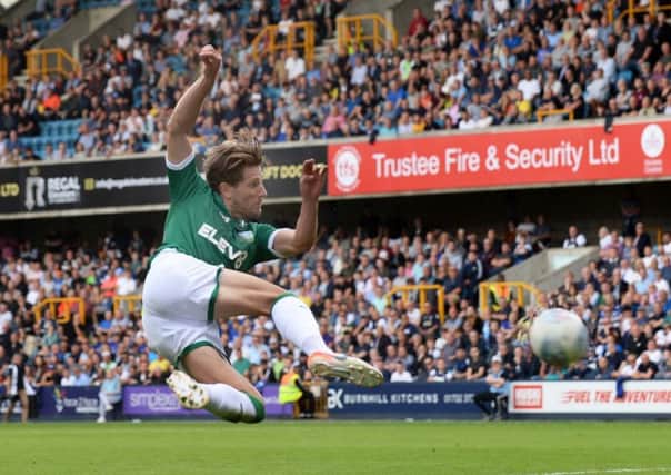 Going close: Sam Hutchinson lets fly.