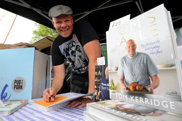 Chef Tom Kerridge signs his book at Pub in the Park, Roundhay Park, Leeds. Picture by Simon Hulme.