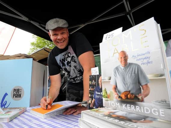 Chef Tom Kerridge signs his book at Pub in the Park, Roundhay Park, Leeds. Picture by Simon Hulme.