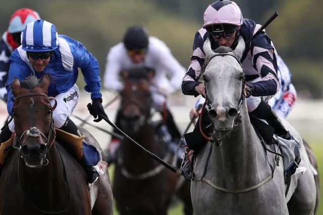 Lord Glitters and Danny Tudhope 9right) are pictured winning last year's Strensall Stakes at the Ebor festival.