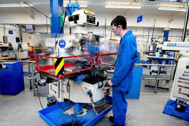 Funding for apprentices is in the spotlight as GCSE results are published. Photo: Rui Vieira/PA Wire