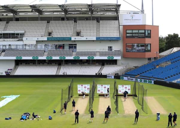England's Joe Root, Joe Denly and Jason Roy bat in front of the new stand during the nets session at Headingley, Leeds.