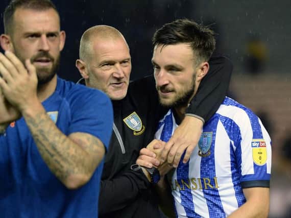Lee Bullen, pictured with Morgan Fox at the final whistle following Sheffield Wednesday's 1-0 win over Luton Town.
